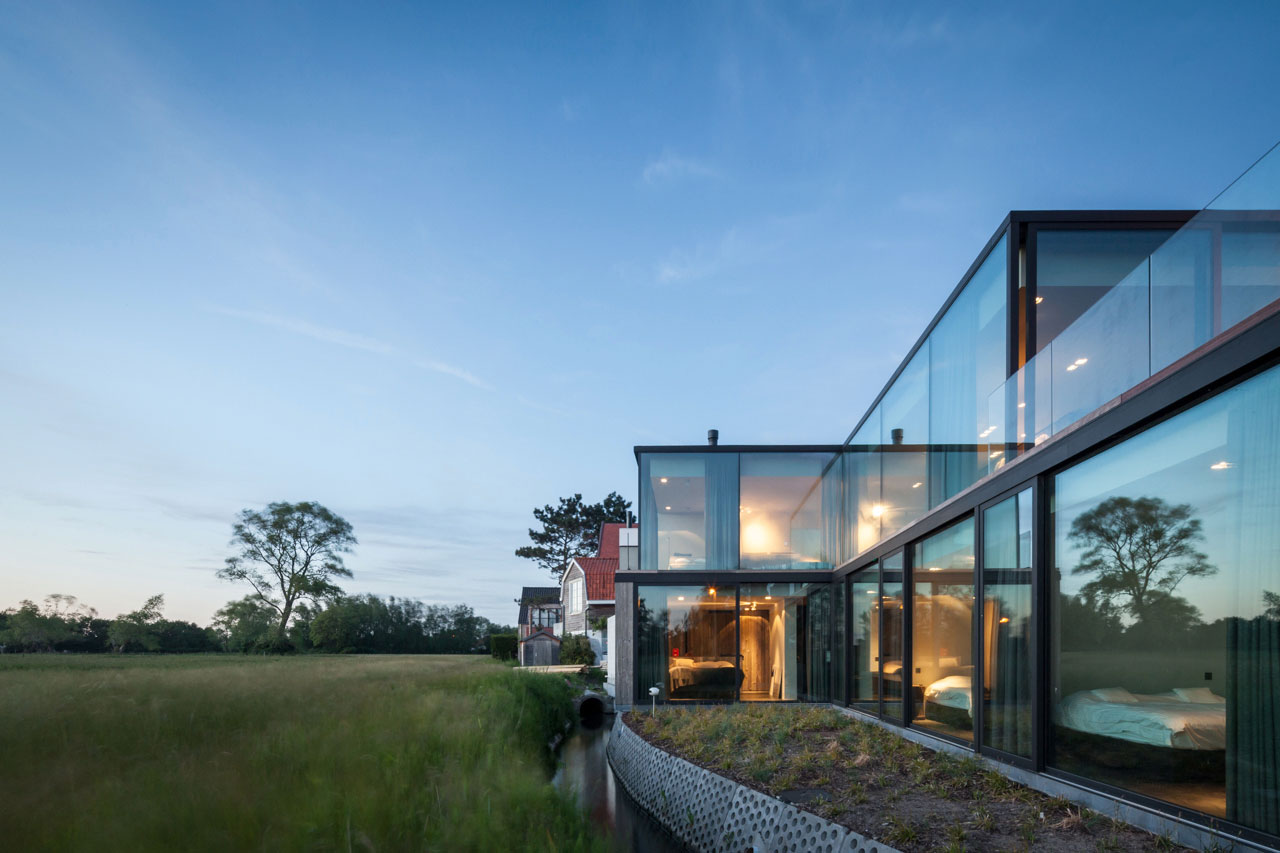 A Spacious Contemporary Home Finished with Concrete, Metal Mesh and Glass in Knokke by Govaert & Vanhoutte Architects (20)