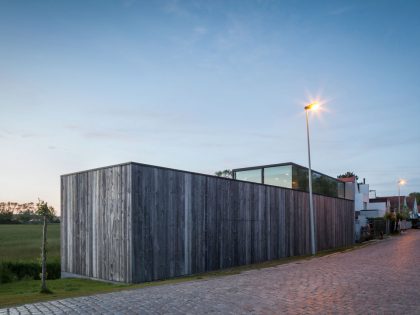 A Spacious Contemporary Home Finished with Concrete, Metal Mesh and Glass in Knokke by Govaert & Vanhoutte Architects (21)