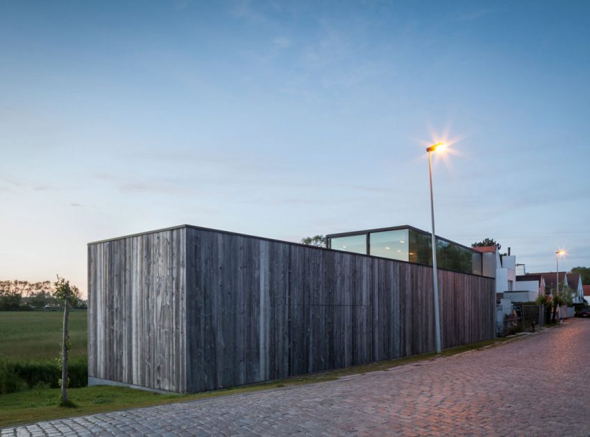 A Spacious Contemporary Home Finished with Concrete, Metal Mesh and Glass in Knokke by Govaert & Vanhoutte Architects (21)