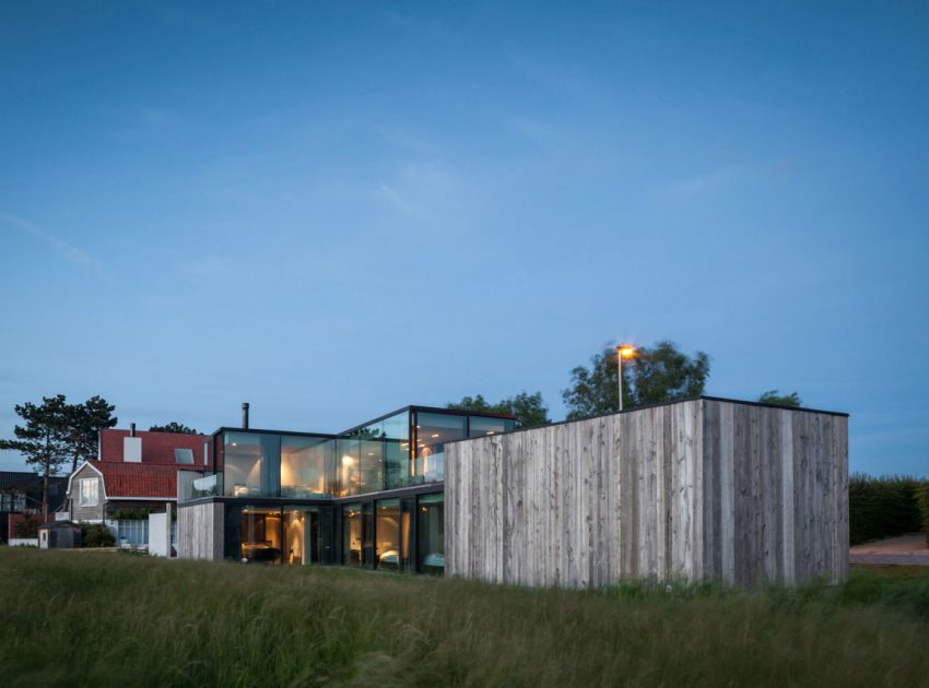 A Spacious Contemporary Home Finished with Concrete, Metal Mesh and Glass in Knokke by Govaert & Vanhoutte Architects (22)