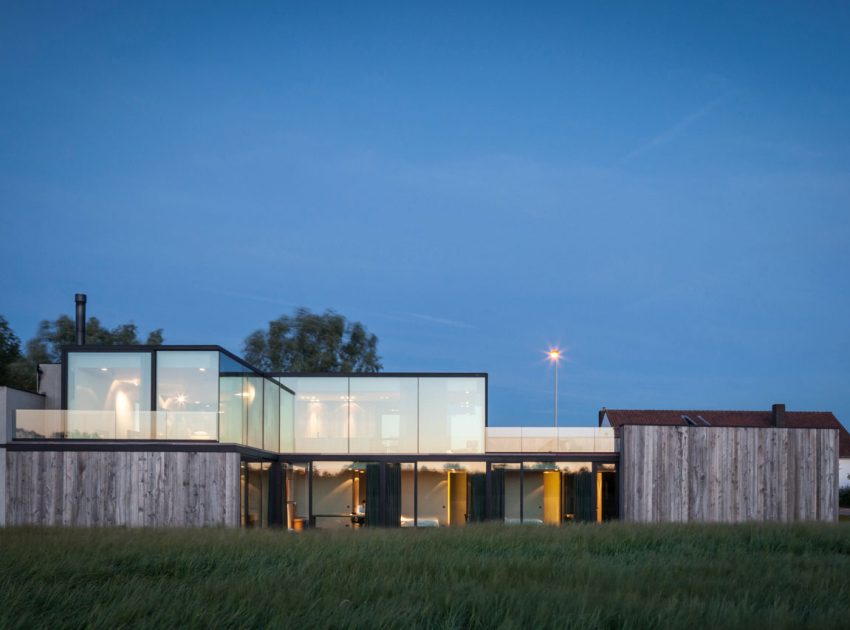 A Spacious Contemporary Home Finished with Concrete, Metal Mesh and Glass in Knokke by Govaert & Vanhoutte Architects (23)