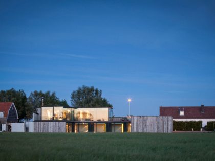 A Spacious Contemporary Home Finished with Concrete, Metal Mesh and Glass in Knokke by Govaert & Vanhoutte Architects (24)