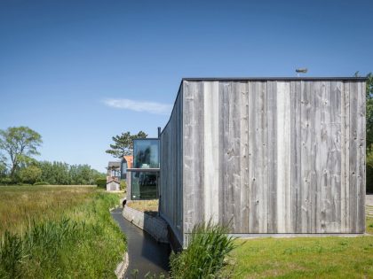 A Spacious Contemporary Home Finished with Concrete, Metal Mesh and Glass in Knokke by Govaert & Vanhoutte Architects (3)