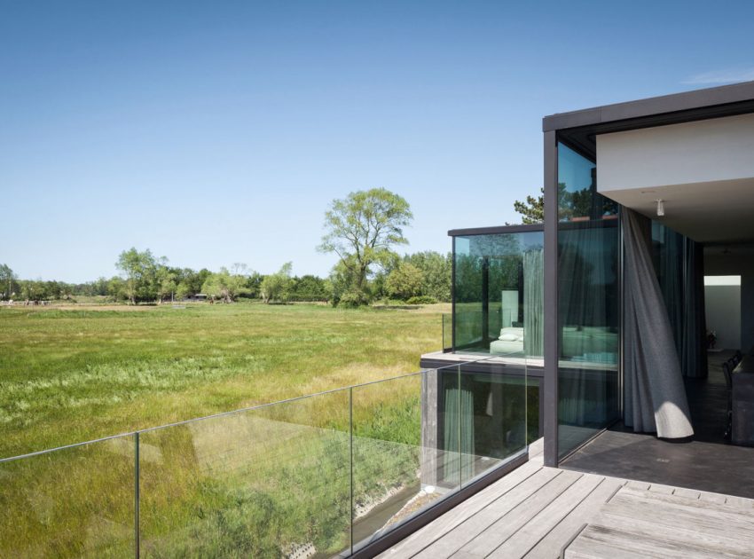 A Spacious Contemporary Home Finished with Concrete, Metal Mesh and Glass in Knokke by Govaert & Vanhoutte Architects (8)