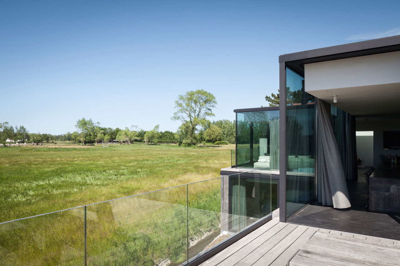 A Spacious Contemporary Home Finished with Concrete, Metal Mesh and Glass in Knokke by Govaert & Vanhoutte Architects (8)