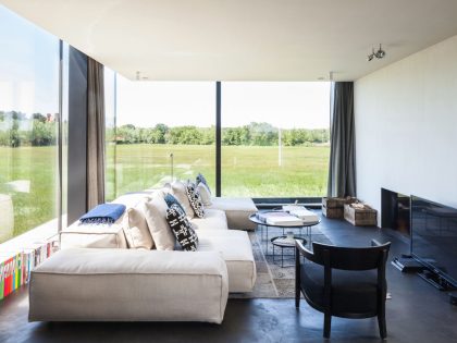 A Spacious Contemporary Home Finished with Concrete, Metal Mesh and Glass in Knokke by Govaert & Vanhoutte Architects (9)
