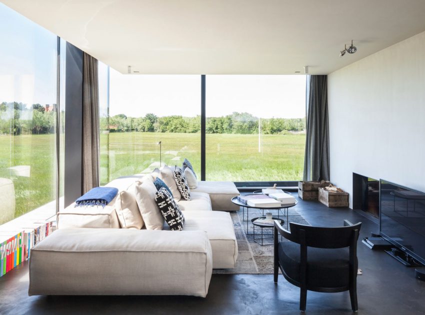 A Spacious Contemporary Home Finished with Concrete, Metal Mesh and Glass in Knokke by Govaert & Vanhoutte Architects (9)