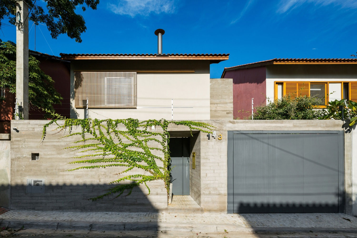 A Spacious Contemporary Home with an Exposed Concrete Box in São Paulo, Brazil by Rocco Arquitetos (3)