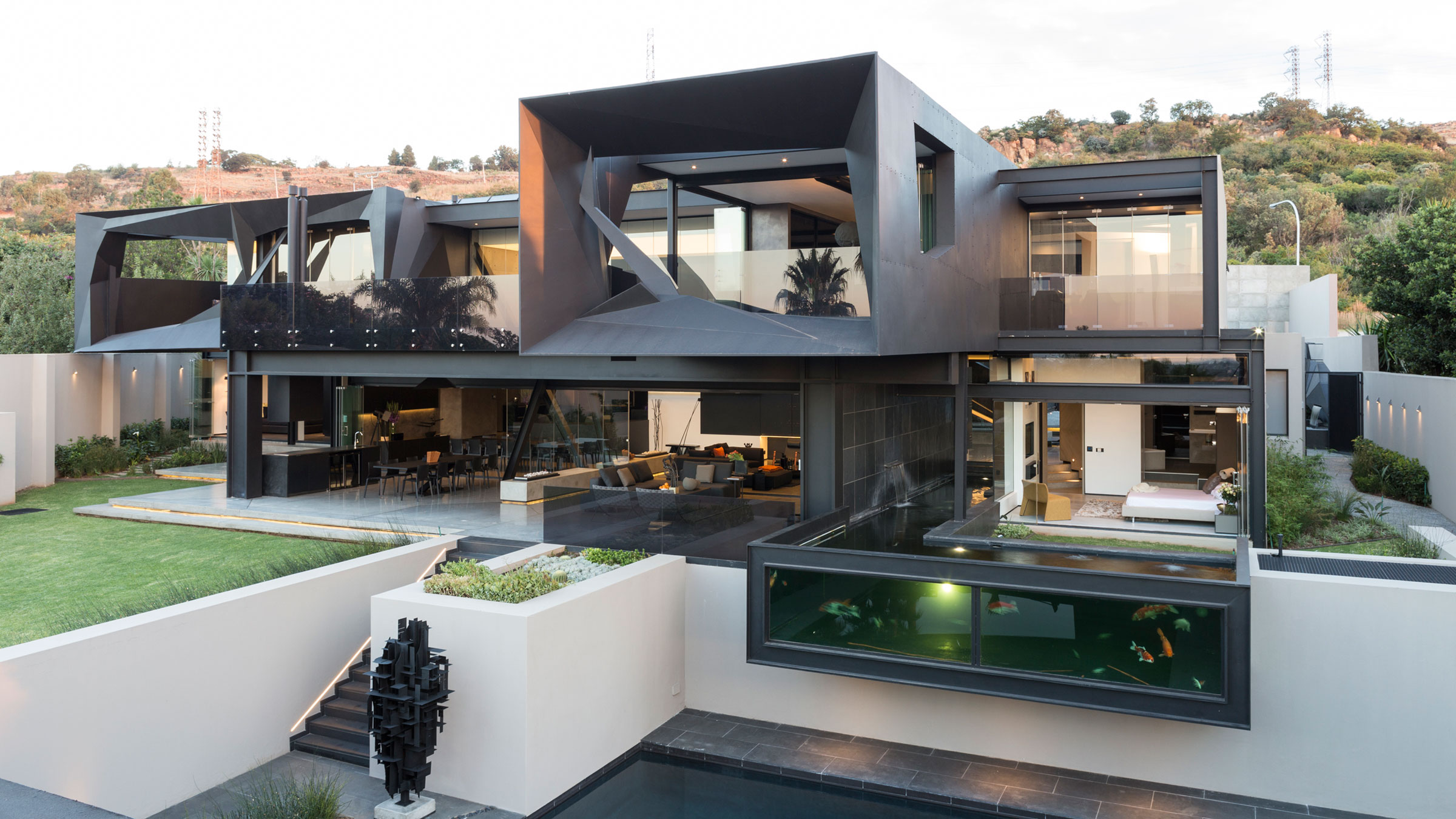 A Spacious Modern Home Made of Steel, Glass and Concrete in Bedfordview by Nico van der Meulen Architects (2)
