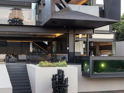 A Spacious Modern Home Made of Steel, Glass and Concrete in Bedfordview by Nico van der Meulen Architects (4)