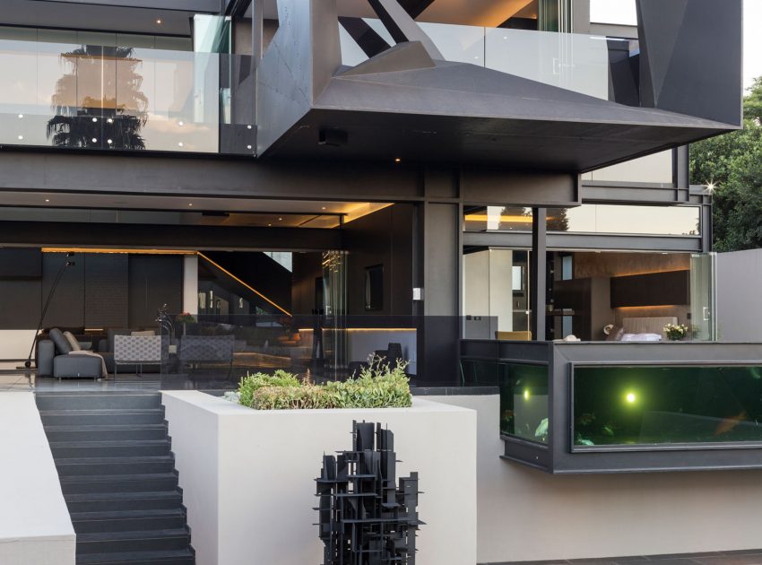 A Spacious Modern Home Made of Steel, Glass and Concrete in Bedfordview by Nico van der Meulen Architects (4)