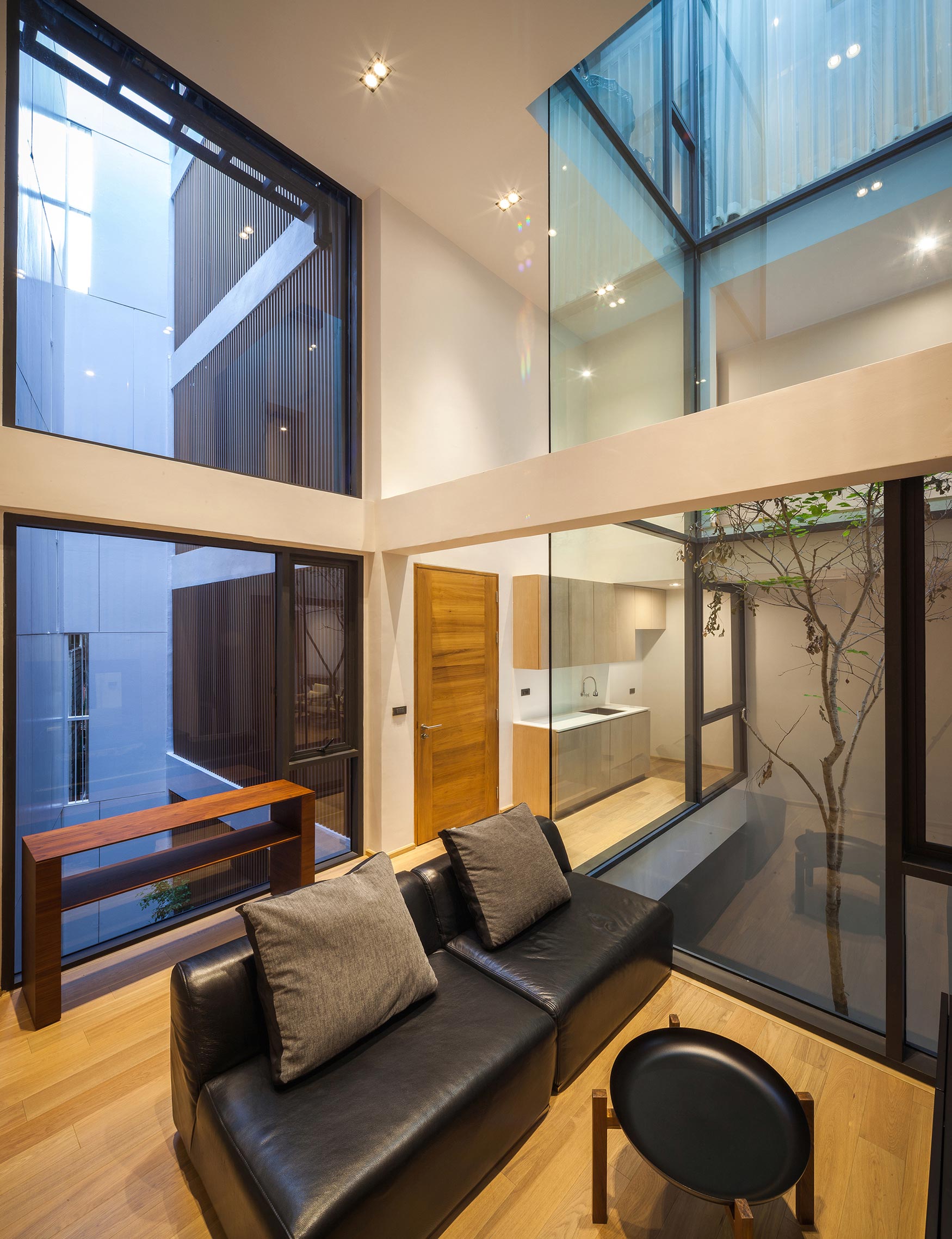 A Spacious and Stylish Modern House for a Big Family in Suriya Wong, Thailand by IDIN Architects (19)