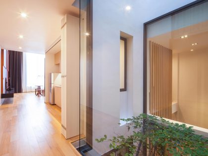 A Spacious and Stylish Modern House for a Big Family in Suriya Wong, Thailand by IDIN Architects (20)