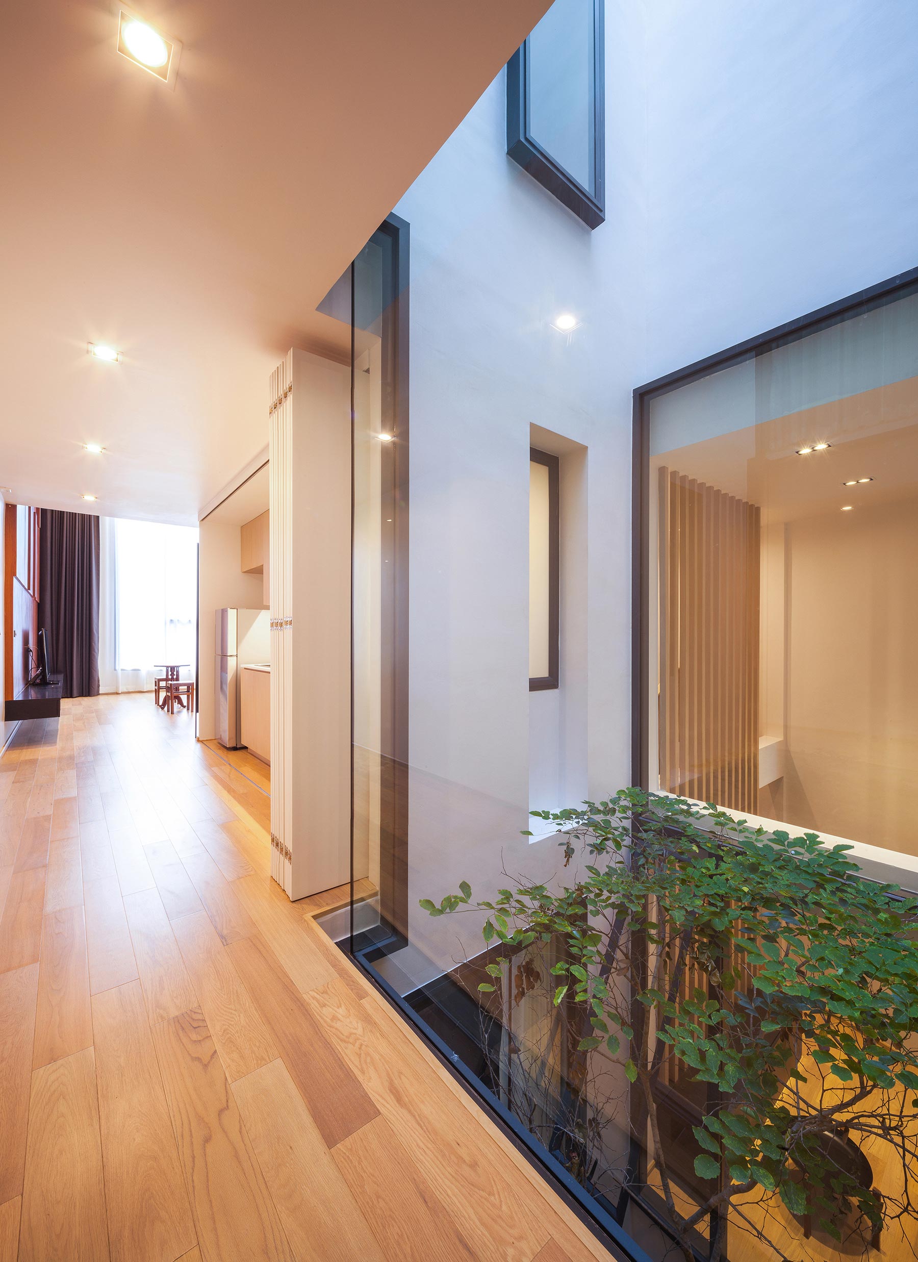 A Spacious and Stylish Modern House for a Big Family in Suriya Wong, Thailand by IDIN Architects (20)