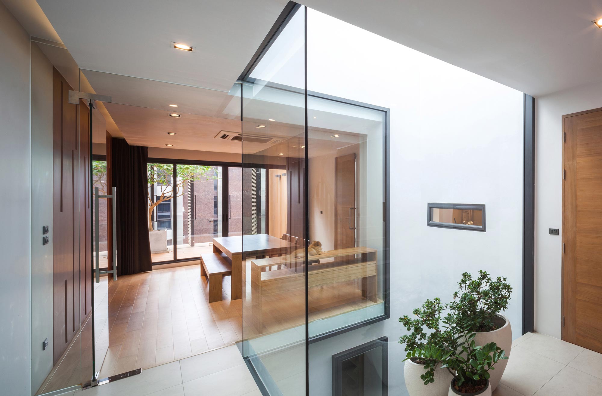 A Spacious and Stylish Modern House for a Big Family in Suriya Wong, Thailand by IDIN Architects (21)