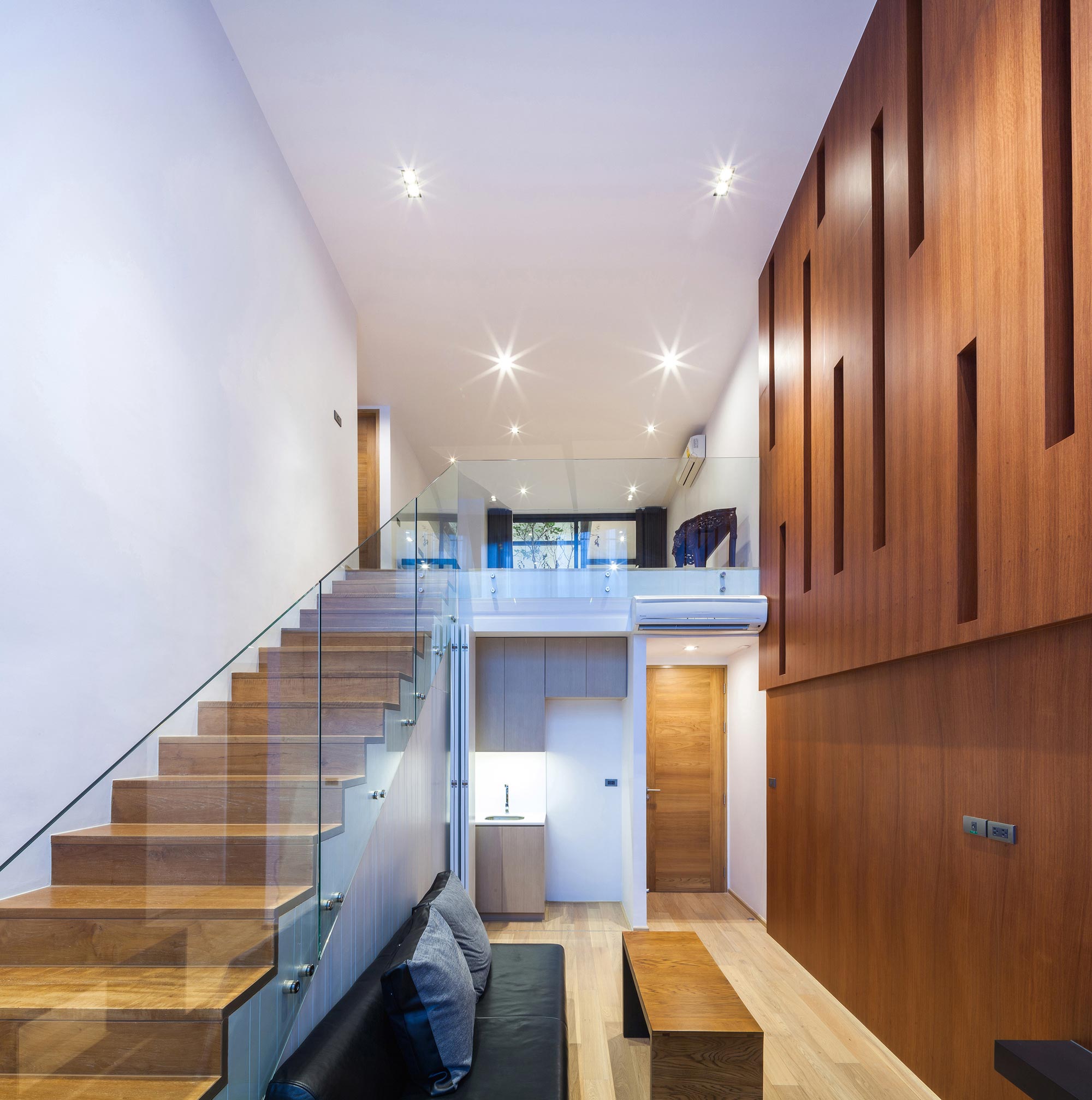 A Spacious and Stylish Modern House for a Big Family in Suriya Wong, Thailand by IDIN Architects (25)