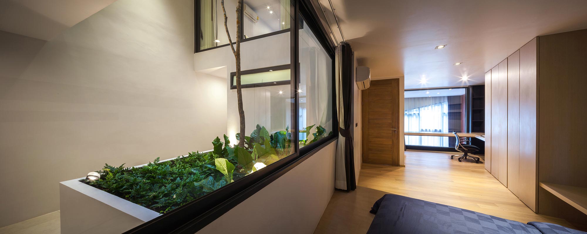 A Spacious and Stylish Modern House for a Big Family in Suriya Wong, Thailand by IDIN Architects (27)