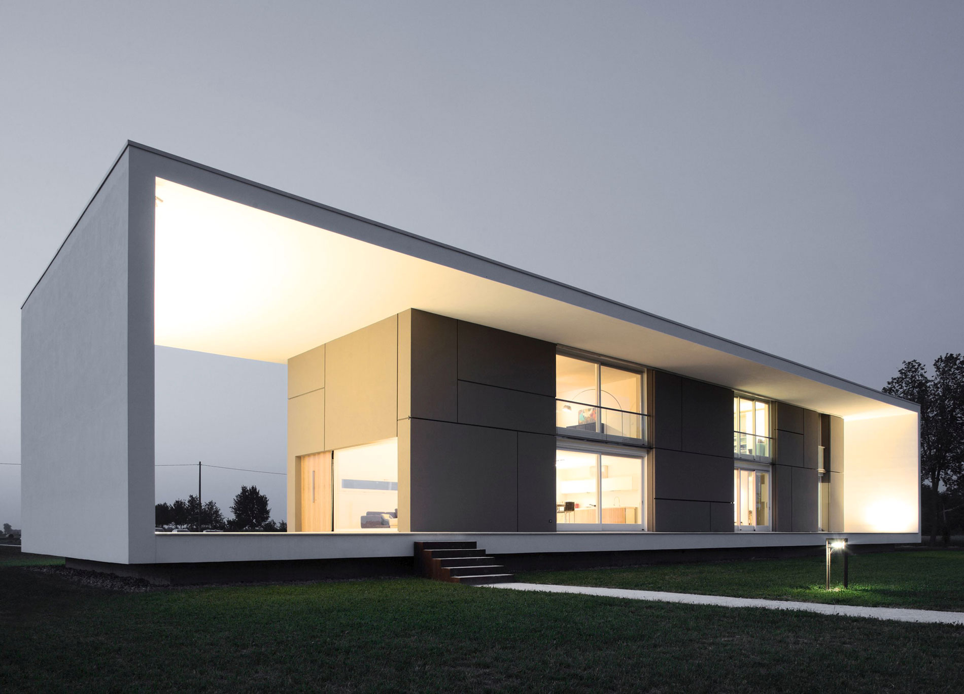 A Striking Contemporary Monolithic House with a Frame in Castelnovo, Italy by Andrea Oliva (13)