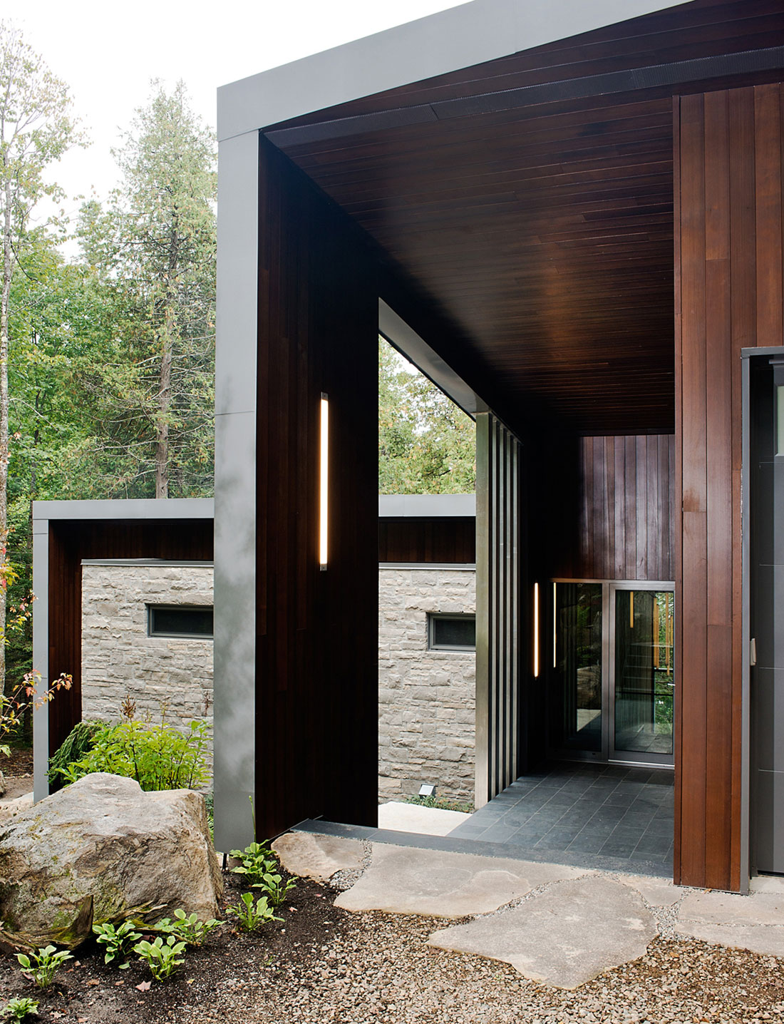 A Stunning Contemporary Home with Large Terrace Nestled in the Woods of Harrington, Quebec by Boom Town (10)