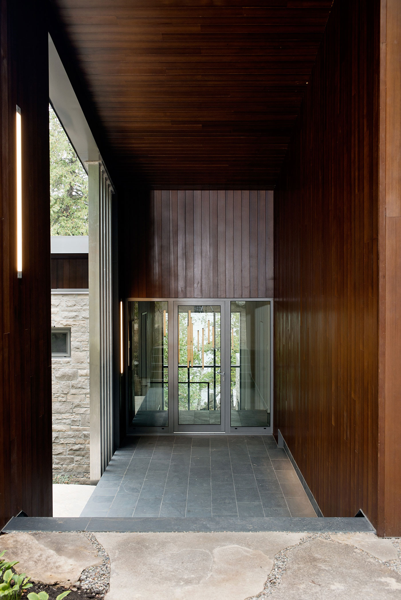 A Stunning Contemporary Home with Large Terrace Nestled in the Woods of Harrington, Quebec by Boom Town (11)