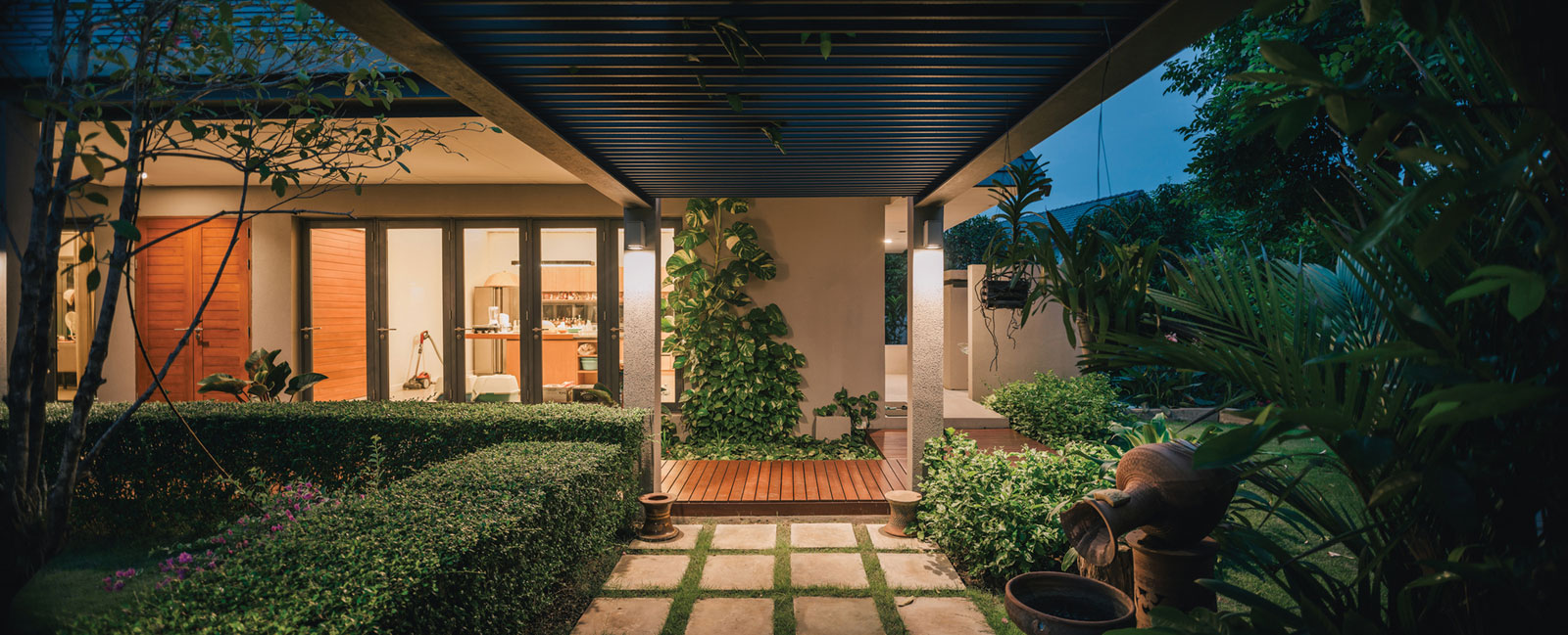 A Stunning Contemporary Triangle House with Gabled Walls in Nakhon Pathom, Thailand by Phongphat Ueasangkhomset (18)