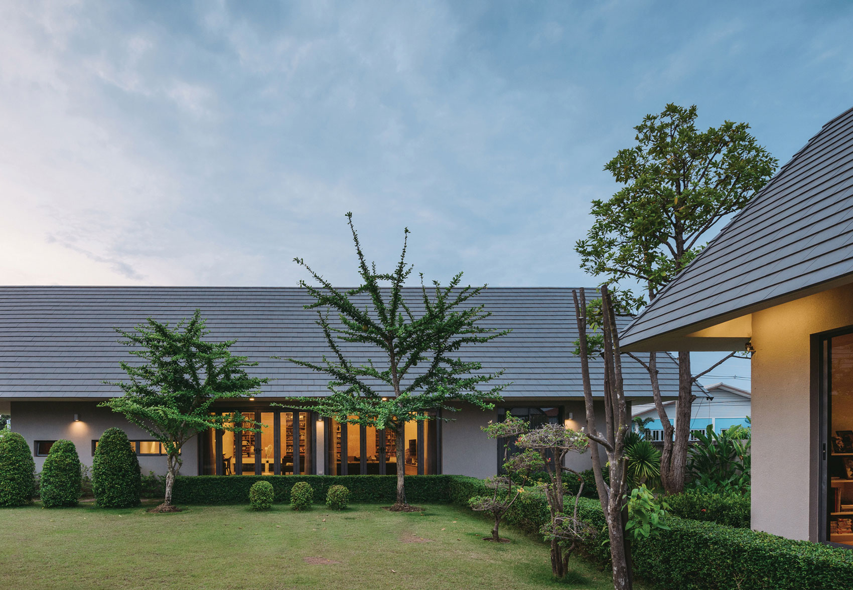 A Stunning Contemporary Triangle House with Gabled Walls in Nakhon Pathom, Thailand by Phongphat Ueasangkhomset (19)