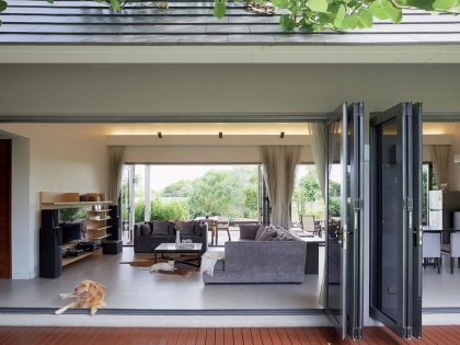 A Stunning Contemporary Triangle House with Gabled Walls in Nakhon Pathom, Thailand by Phongphat Ueasangkhomset (6)