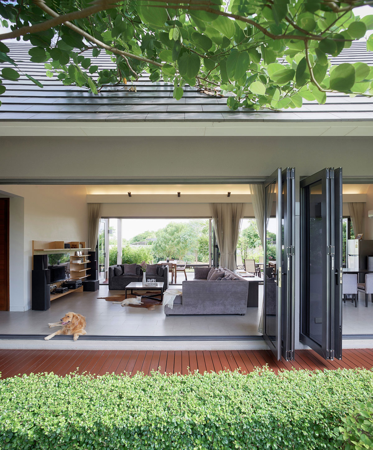 A Stunning Contemporary Triangle House with Gabled Walls in Nakhon Pathom, Thailand by Phongphat Ueasangkhomset (6)