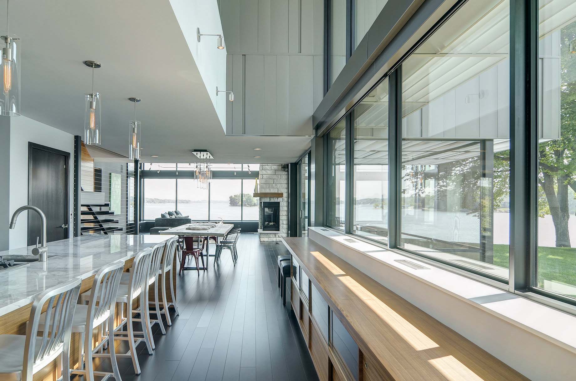 A Stunning Glass Lake House with Modern Silhouette of Earthy Materials in Minnesota by Rosenow | Peterson Design (27)