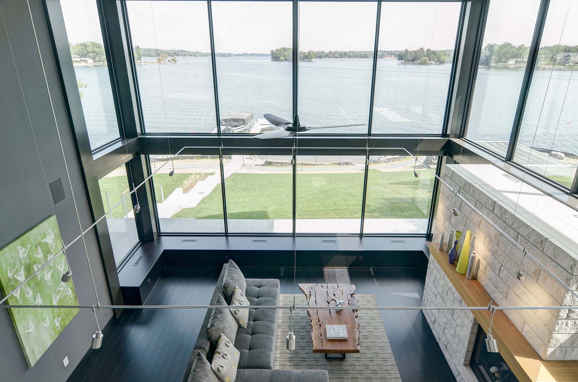 A Stunning Glass Lake House with Modern Silhouette of Earthy Materials in Minnesota by Rosenow | Peterson Design (32)