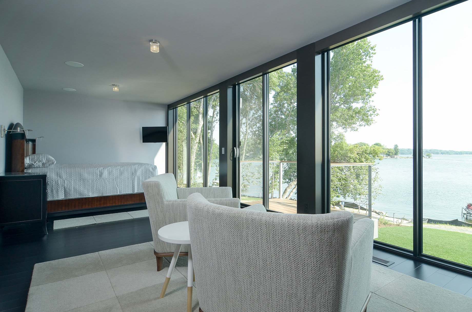 A Stunning Glass Lake House with Modern Silhouette of Earthy Materials in Minnesota by Rosenow | Peterson Design (40)