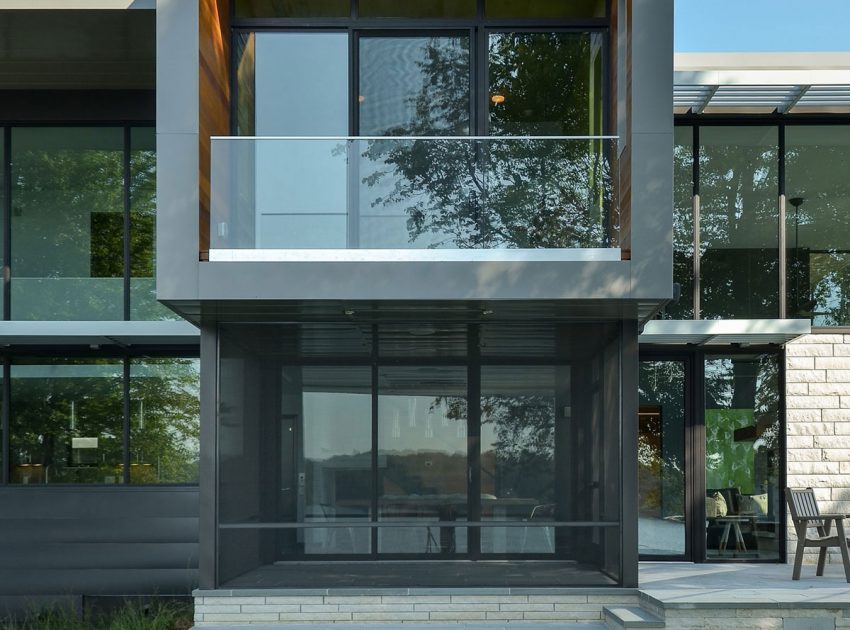 A Stunning Glass Lake House with Modern Silhouette of Earthy Materials in Minnesota by Rosenow | Peterson Design (9)