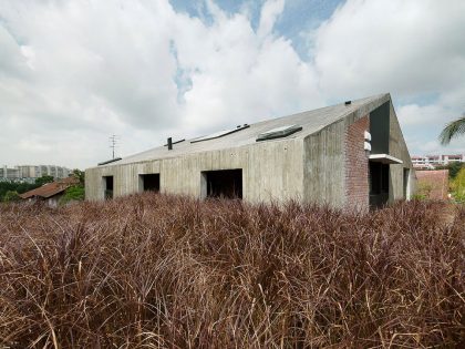 A Stunning Modern Bungalow with Red Brick and Concrete Structure in Singapore by ipli architects (1)