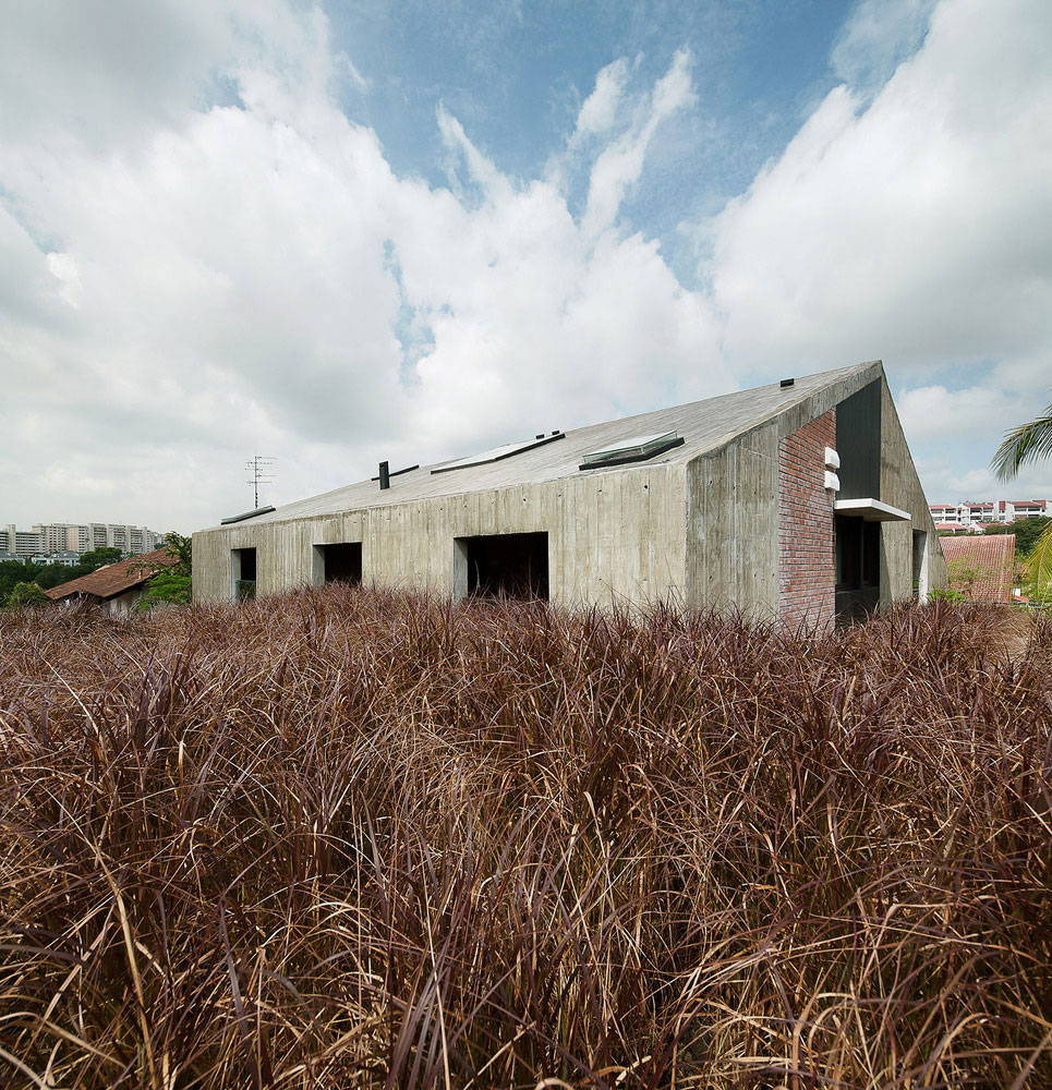 A Stunning Modern Bungalow with Red Brick and Concrete Structure in Singapore by ipli architects (1)
