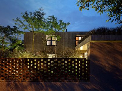 A Stunning Modern Bungalow with Red Brick and Concrete Structure in Singapore by ipli architects (12)