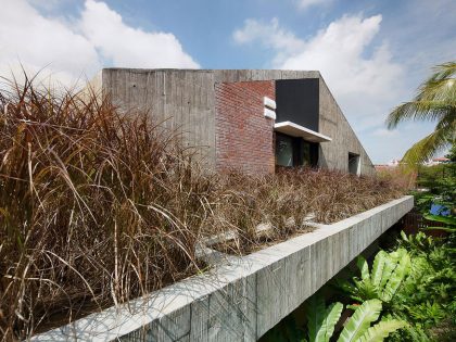 A Stunning Modern Bungalow with Red Brick and Concrete Structure in Singapore by ipli architects (3)