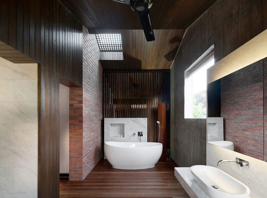 A Stunning Modern Bungalow with Red Brick and Concrete Structure in Singapore by ipli architects (9)
