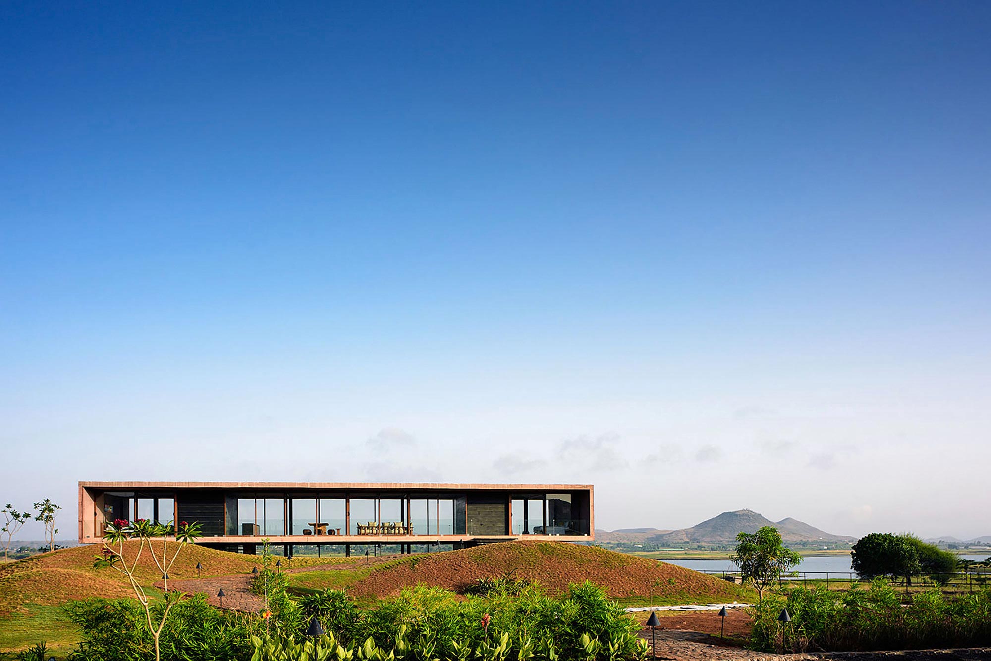 A Stunning Modern Concrete Home with Simple Interiors in Nashik, India by Ajay Sonar (1)