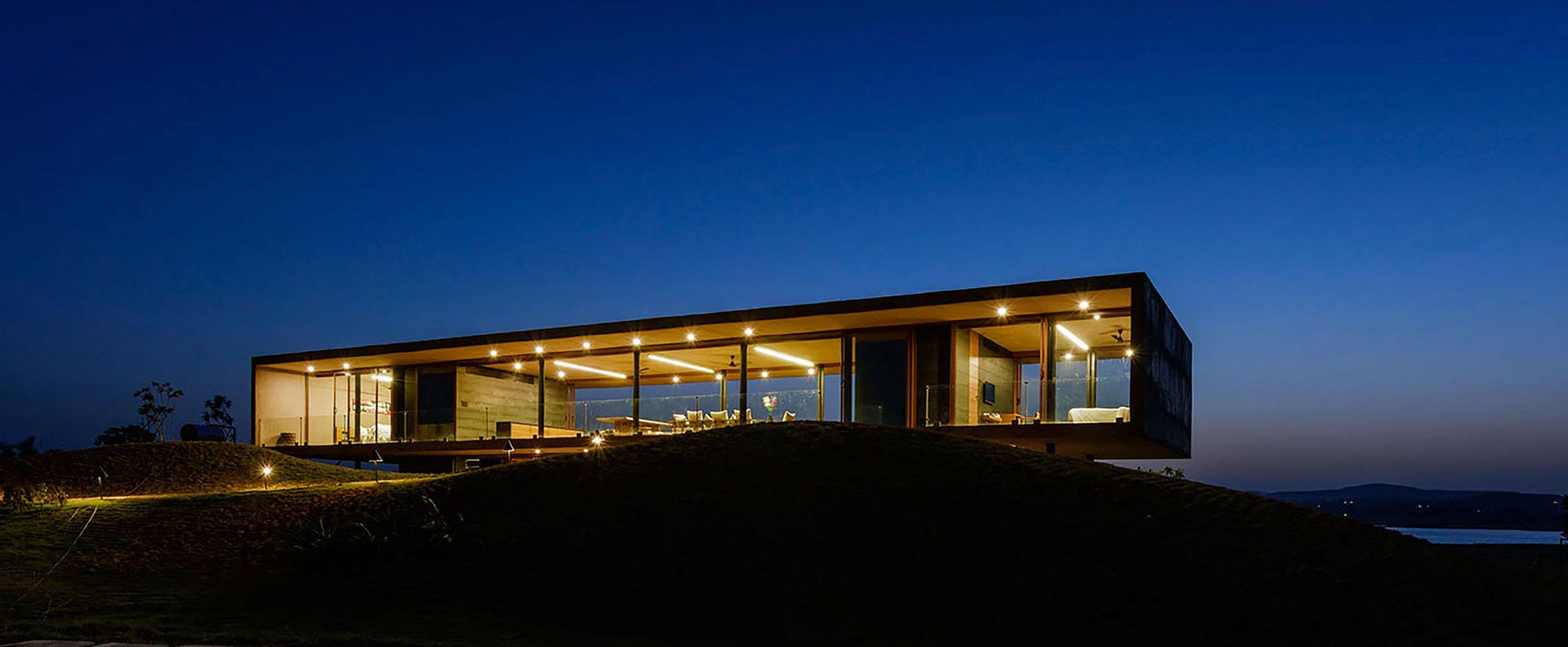 A Stunning Modern Concrete Home with Simple Interiors in Nashik, India by Ajay Sonar (14)