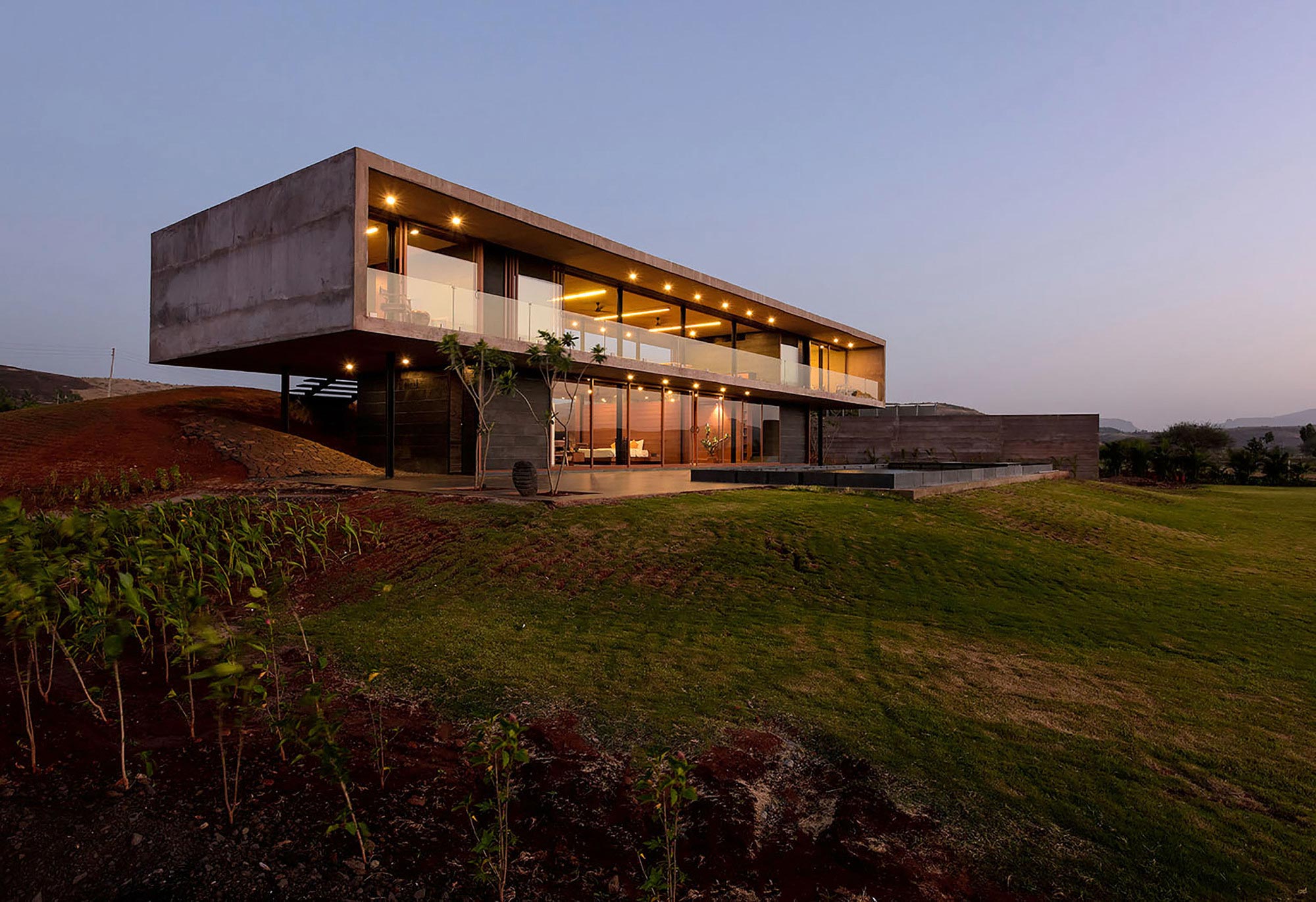 A Stunning Modern Concrete Home with Simple Interiors in Nashik, India by Ajay Sonar (15)