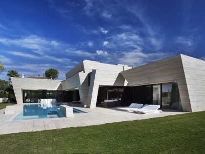 A Stylish Contemporary Concrete House with Black Glass and Marble Facade in Seville