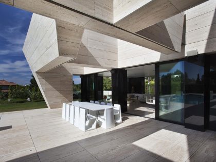 A Stylish Contemporary Concrete House with Black Glass and Marble Facade in Seville by A-cero (10)