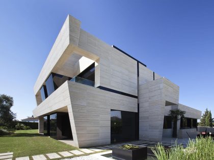 A Stylish Contemporary Concrete House with Black Glass and Marble Facade in Seville by A-cero (15)