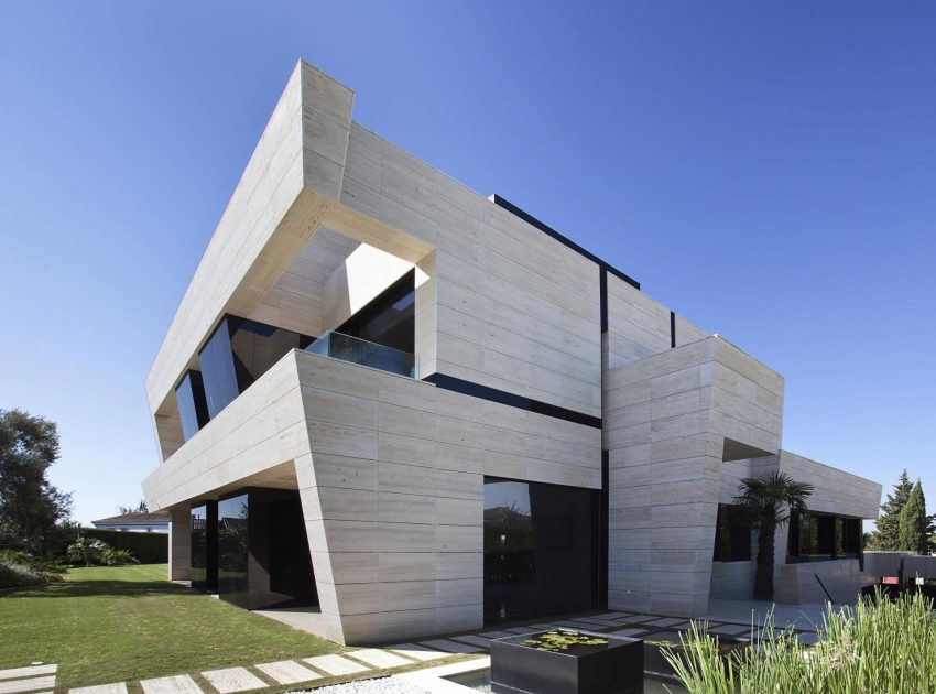 A Stylish Contemporary Concrete House with Black Glass and Marble Facade in Seville by A-cero (15)