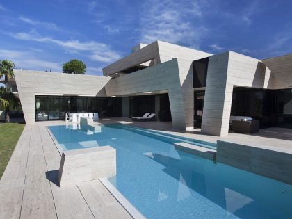 A Stylish Contemporary Concrete House with Black Glass and Marble Facade in Seville by A-cero (2)