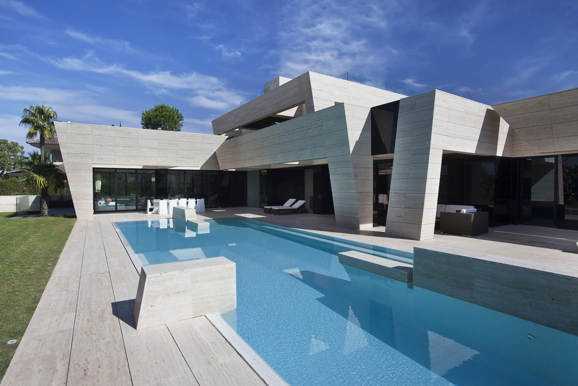 A Stylish Contemporary Concrete House with Black Glass and Marble Facade in Seville by A-cero (2)