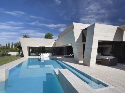 A Stylish Contemporary Concrete House with Black Glass and Marble Facade in Seville by A-cero (3)