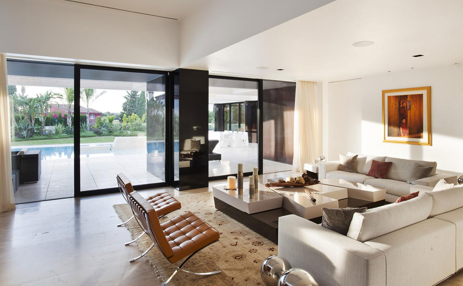 A Stylish Contemporary Concrete House with Black Glass and Marble Facade in Seville by A-cero (32)