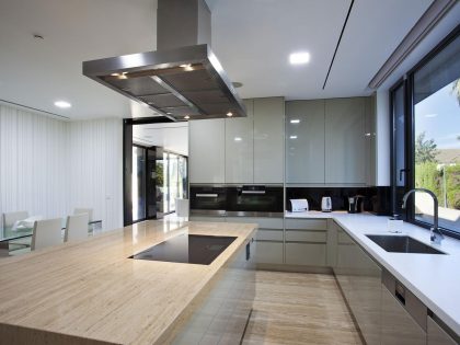 A Stylish Contemporary Concrete House with Black Glass and Marble Facade in Seville by A-cero (39)
