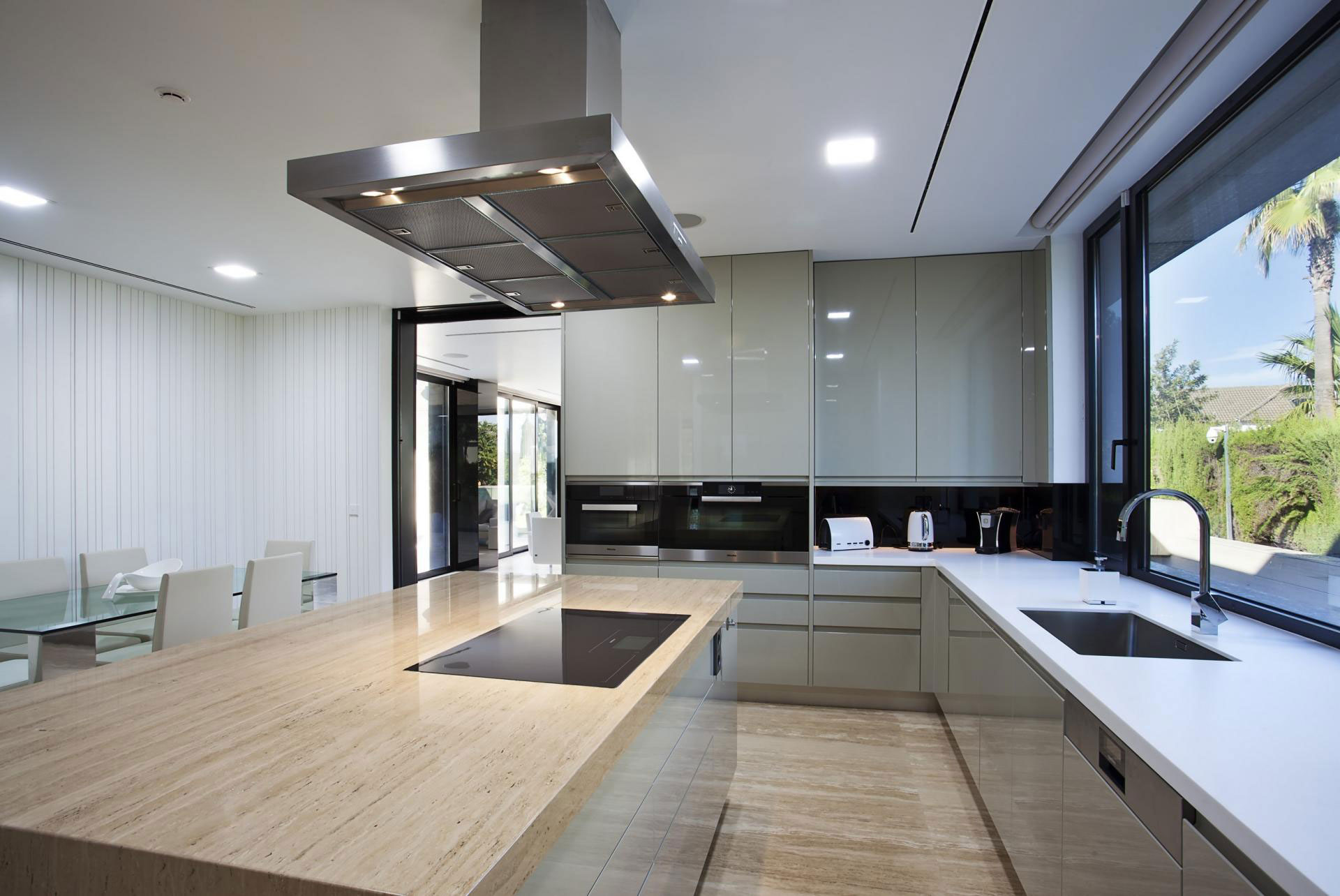 A Stylish Contemporary Concrete House with Black Glass and Marble Facade in Seville by A-cero (39)